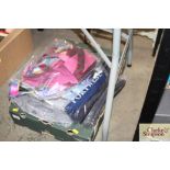 A box containing various clothing, to include a ba