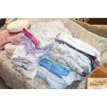 A large quantity of various bed linen etc