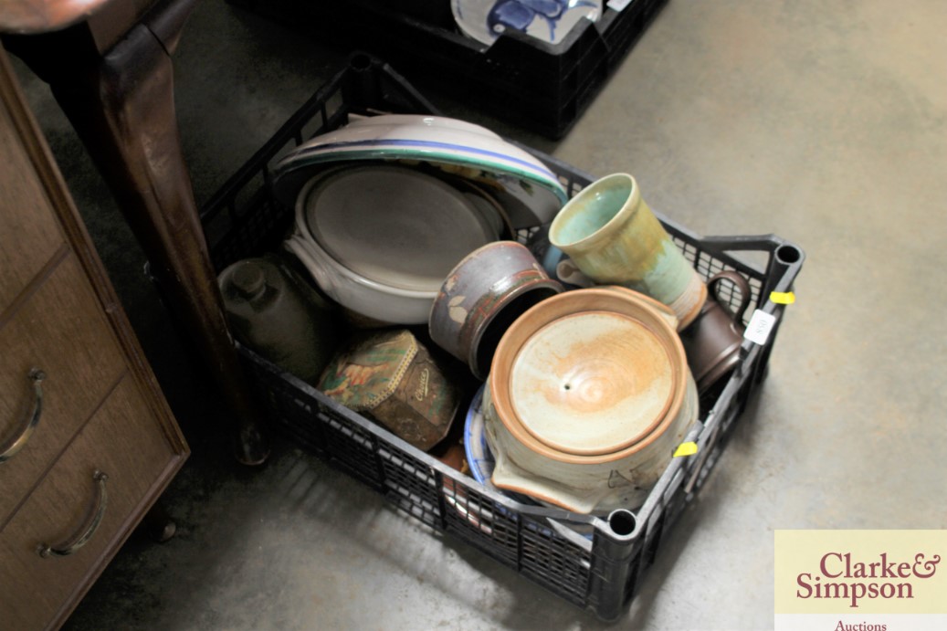 A box of various pottery items