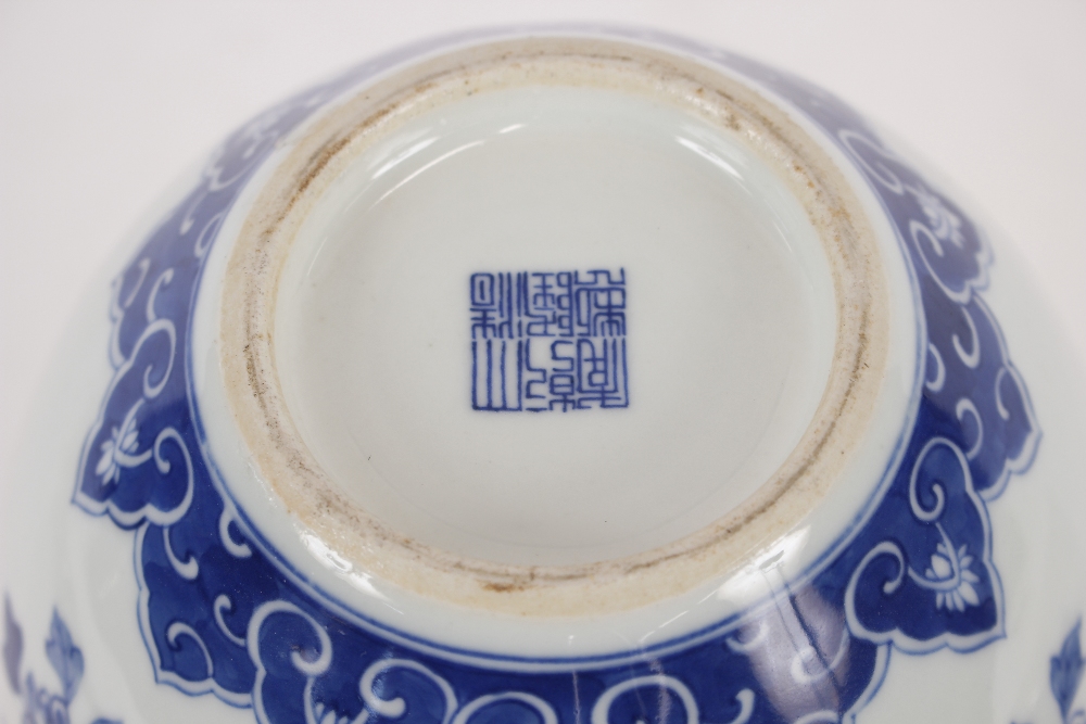 A Chinese blue and white baluster vase, with floral decoration and under glaze blue seal mark to - Image 2 of 11