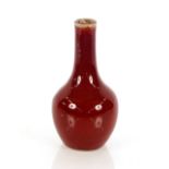 A Chinese Sang de Boeuf vase, of baluster form, 23cm high