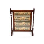 A 20th Century oak firescreen, having William Morris style embroidered panel, and panel verso