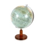 A Philips world globe, the wooden stand inset with a compass, 42cm high