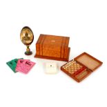 A miniature boxed chess set; together with Studebaker cards; a large box with crown to top; and