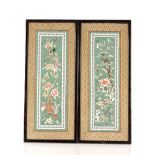 A pair of Chinese silk embroideries, 58cm x 23cm
