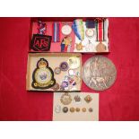 A collection of various medals and buttons, Death Plaque, cloth badges etc.