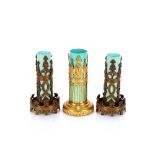 A pair of late Victorian porcelain and gilded metal spill vases, 15cm high; and a slightly larger