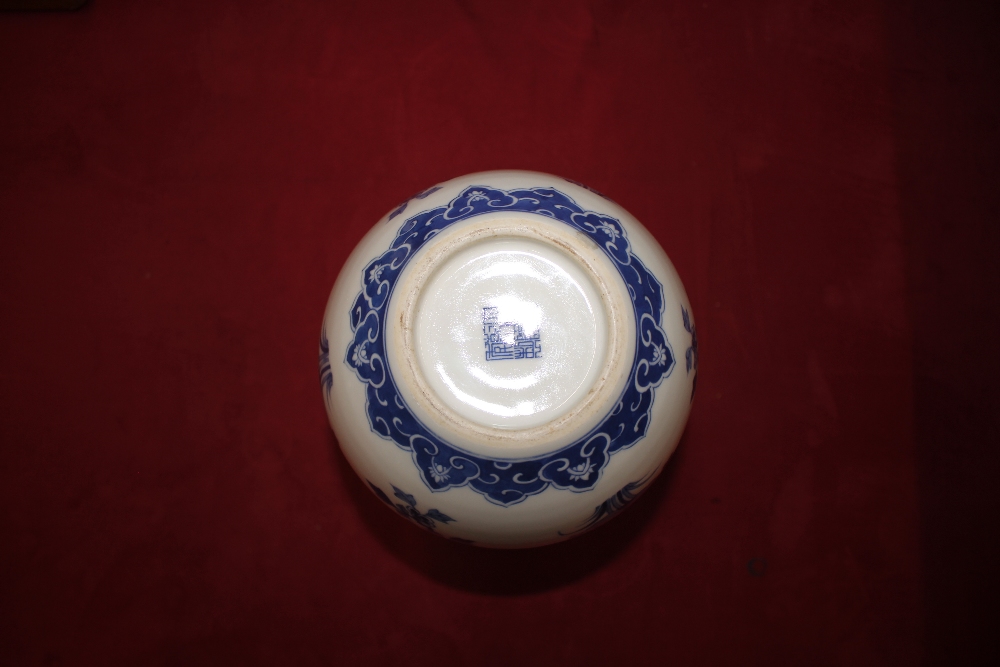 A Chinese blue and white baluster vase, with floral decoration and under glaze blue seal mark to - Image 8 of 11