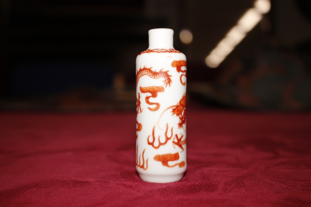 A 19th Century Chinese porcelain cylindrical snuff bottle, finely painted in iron red, having dragon - Image 7 of 9