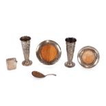 A silver Vesta case; a Victorian silver caddy spoon; two silver mounted small circular photograph