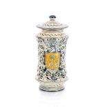 An alberello type jar and cover, decorated central heraldic crest and foliate scrolls, inscribed