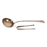 A George III silver "Old English" pattern ladle, foliate decorated and with family crest, London