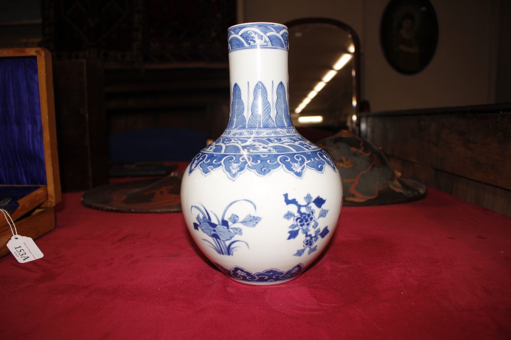 A Chinese blue and white baluster vase, with floral decoration and under glaze blue seal mark to - Image 5 of 11