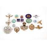 Eight period army cap badges, to include Royal Warwickshire Regiment, Cameron Highlanders, Kings