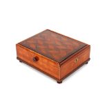 A 19th Century mahogany and rosewood box, having parquetry sliding lid containing various chess