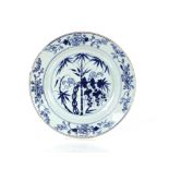 Five 19th Century Chinese blue and white plates, decorated with squirrels amongst bamboo shoots,