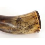 A 19th Century horn shot flask, decorated with a scene of a hunter and inscribed "Isaac Neame 1762",