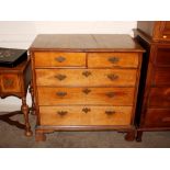 An 18th Century walnut chest, of two short and three long drawers raised on bracket feet, 52cm wide