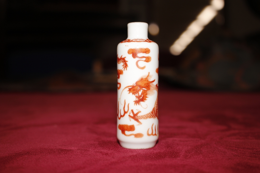 A 19th Century Chinese porcelain cylindrical snuff bottle, finely painted in iron red, having dragon - Image 5 of 9