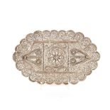 A fine filigree work silvered tray