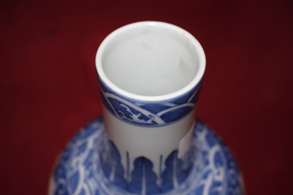 A Chinese blue and white baluster vase, with floral decoration and under glaze blue seal mark to - Image 7 of 11