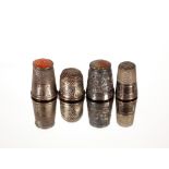 Four antique thimbles