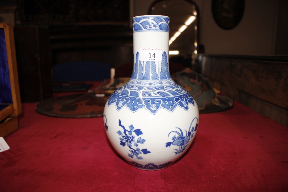 A Chinese blue and white baluster vase, with floral decoration and under glaze blue seal mark to - Image 3 of 11