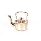 A continental white metal miniature kettle, 8cm high