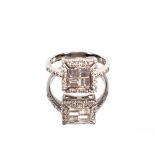 A 18ct white gold ring, set with diamonds, 3.7gms total weight, size "K½"