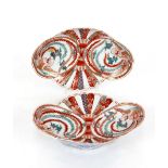 A pair of Imari pattern shell shaped dishes, heightened in gilt, 17.5cm