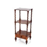 A Victorian rosewood whatnot, raised on barley twist columns fitted with a base single drawer,