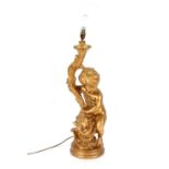 A decorative gilt cherub lamp, 69cm high