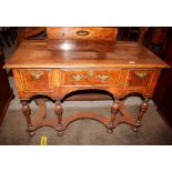 An 18th Century walnut and cross banded side table, fitted three drawers raised on baluster turned