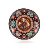 An antique cloisonné shallow dish, decorated central study of dragon and bird within multifloral