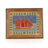 An antique wool work picture, depicting a sailing ship in gilt frame, 37cm x 48cm