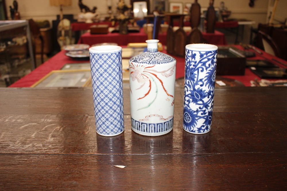 A 19th Century Japanese bottle vase, having floral bird and cloud decoration, 18cm high; and two - Image 4 of 11