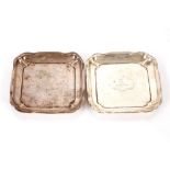 A pair of small silver dishes by Mappin & Webb, London 1910; a silver cigarette case, Birmingham