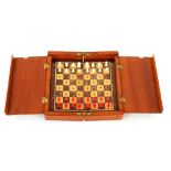 A Jaques mahogany cased travelling chess set