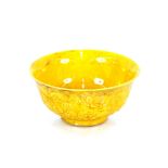 A Chinese yellow ground porcelain bowl, having raised decoration of dragons and foliage, six