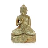 A small green hardstone figure of seated Buddha, 13cm high