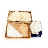 Two boxes of assorted hand made lace and crochet work, samples edgings etc.
