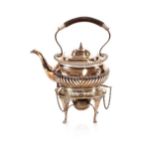 A plated five o'clock tea kettle on spirit heater stand, by The Goldsmiths & Silversmiths Co.; and a
