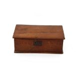 An 18th Century oak Bible box, the lid inscribed "M.P. Her Box 1783" within a heart shaped motif,