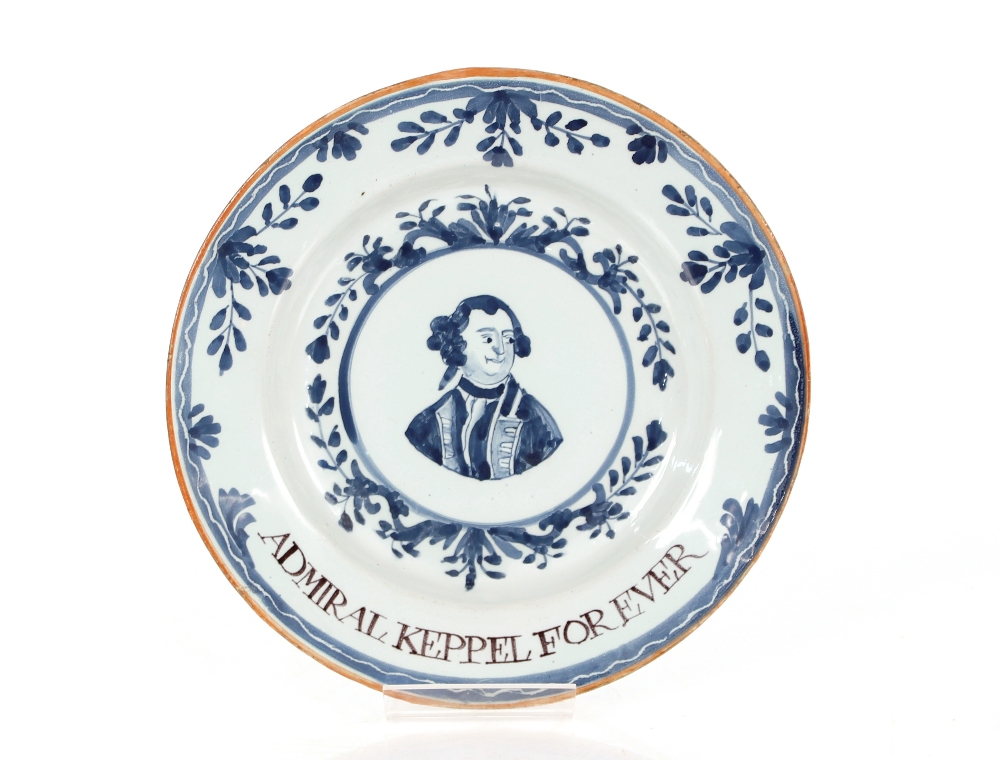 A 18th Century Delftware plate, "Admiral Keppel For Ever", the centre with head and shoulders