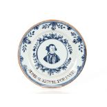 A 18th Century Delftware plate, "Admiral Keppel For Ever", the centre with head and shoulders