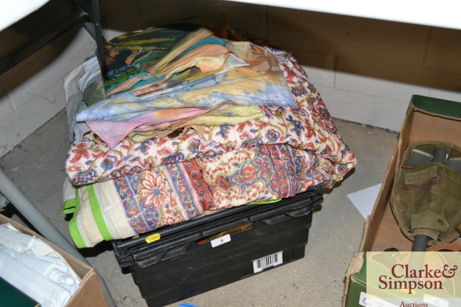 A box of various textiles