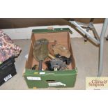 A box of assorted WW2 military equipment