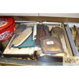 A silver backed dressing table set and a plated si