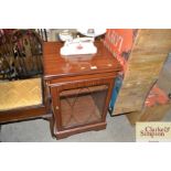 A mahogany stereo cabinet