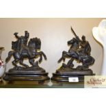 A pair of spelter figures depicting knights on hor